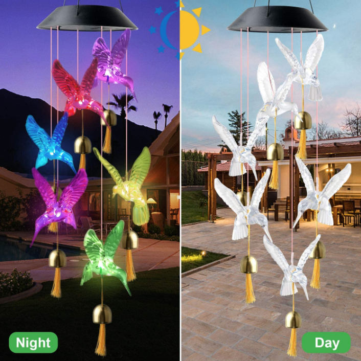 Hummingbird solar wind chime during day and evening