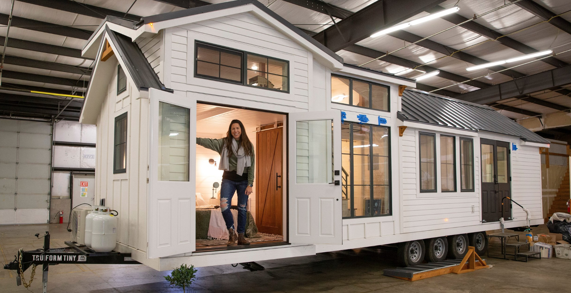 Woman with her tiny house